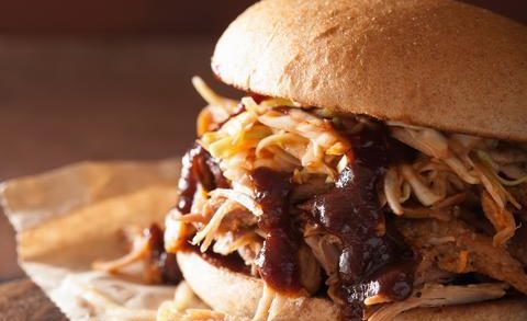 homemade pulled pork burger with coleslaw and bbq sauce