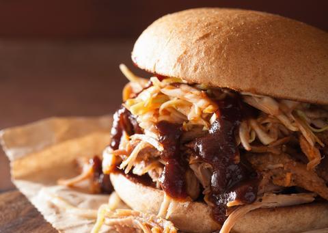 homemade pulled pork burger with coleslaw and bbq sauce